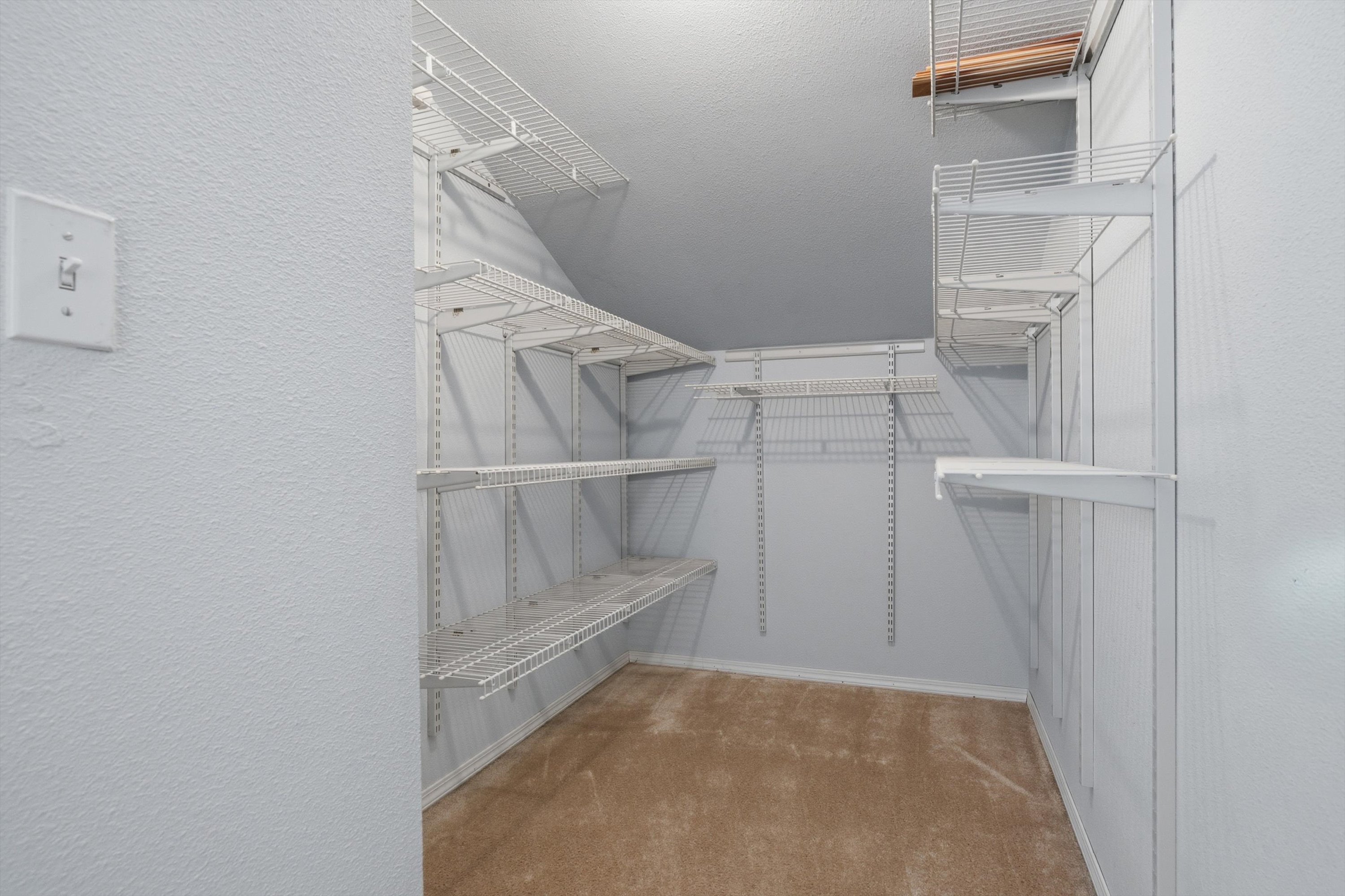 Primary Suite — Walk-In Closet